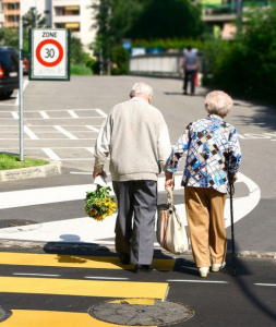 Does Medicare Work Anywhere? 3 married couple walking from store